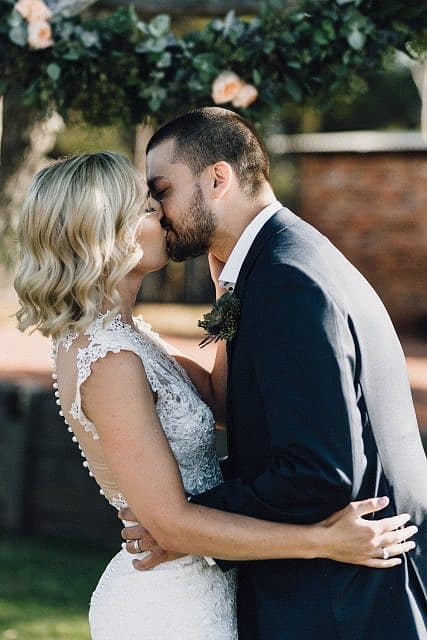 Bride & Groom share their first kiss after their ceremony at Albion on the Swan