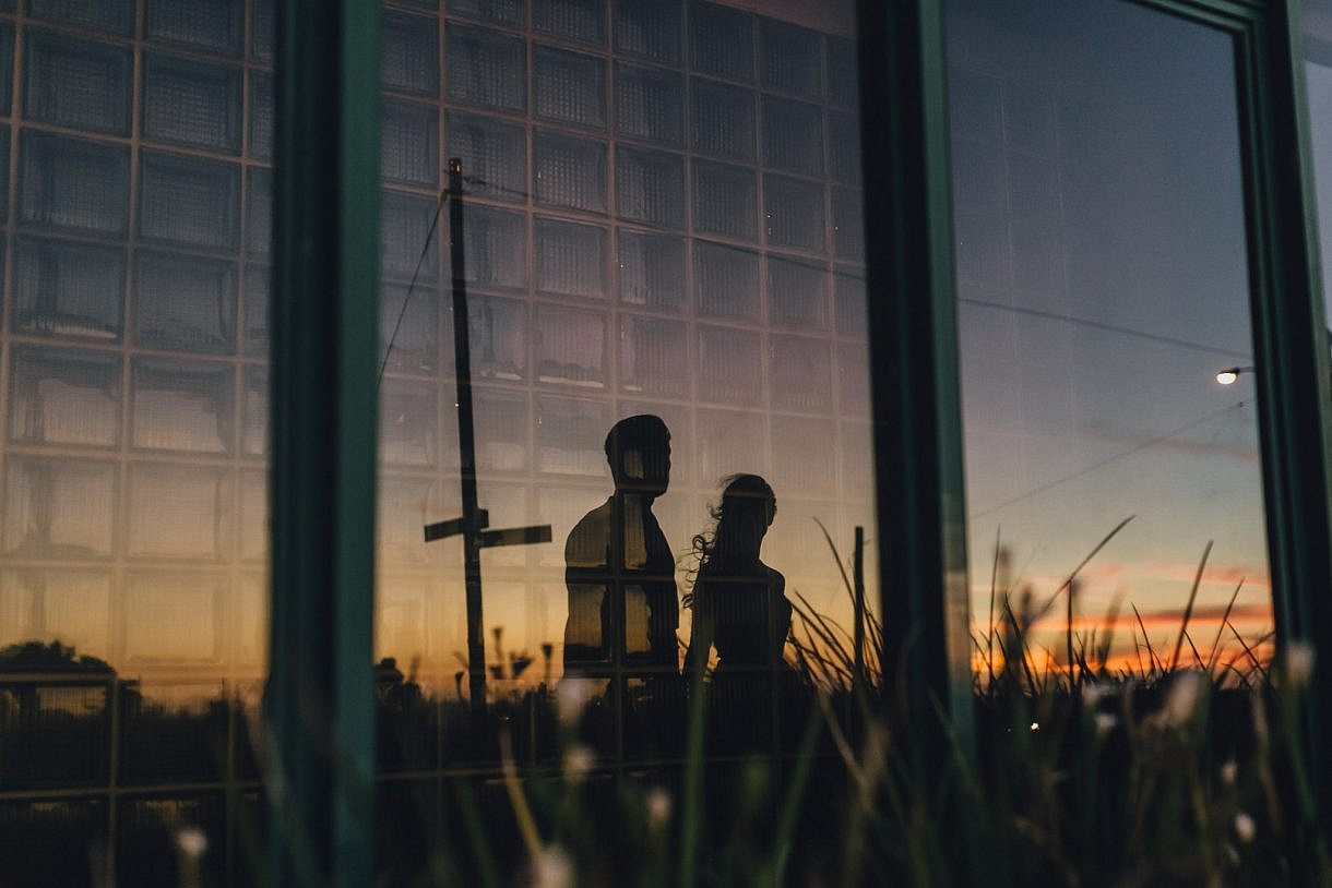 Reflection of couple Adam Levi Browne Photography Leighton Beach