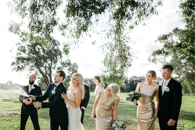 Bridal Party Popping Champagne Guildford