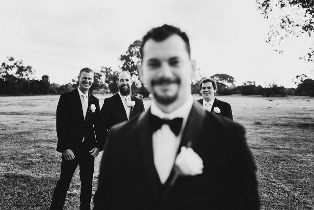 Groomsmen In A Field