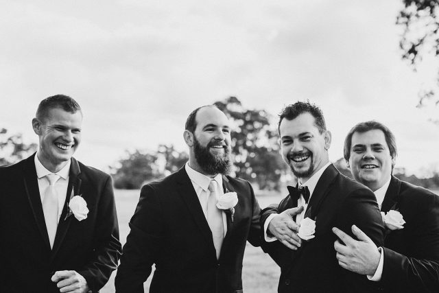 Groomsmen In A Field