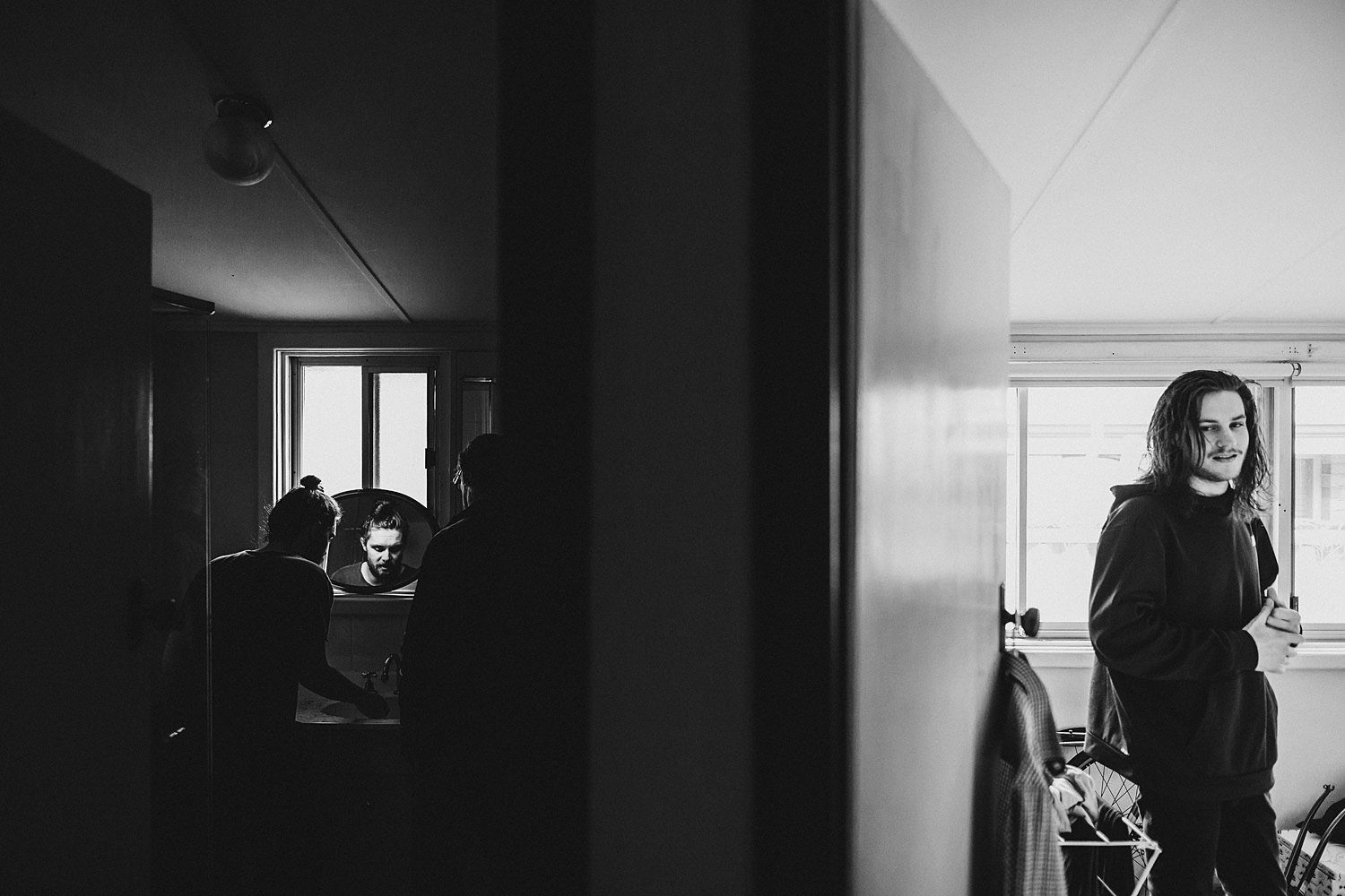 Dark Moody Groom Getting Ready