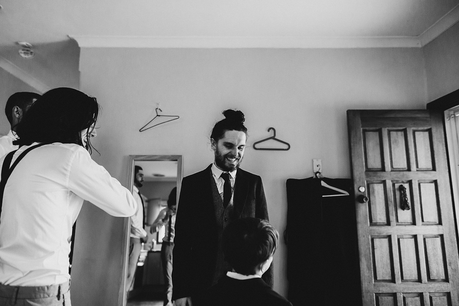 Groom Laughing At Page Boy