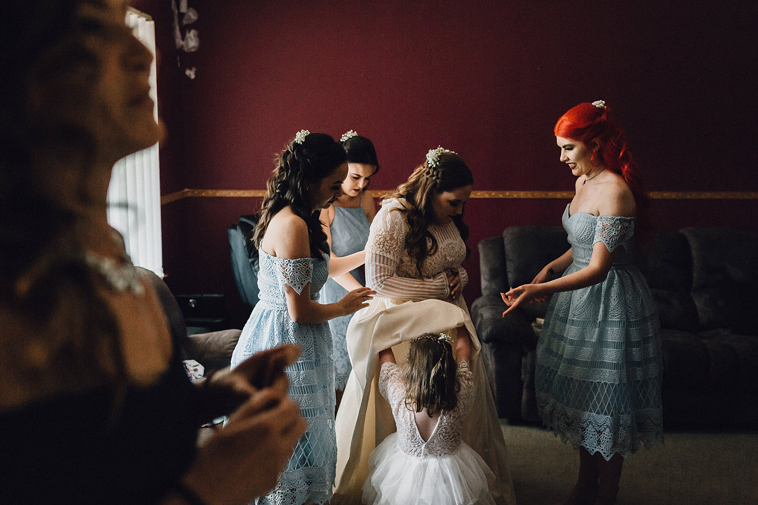 https://adamlevibrownephotography.com.au/wp-content/uploads/2017/10/023-flower-girl-hiding-under-wedding-dress.jpg