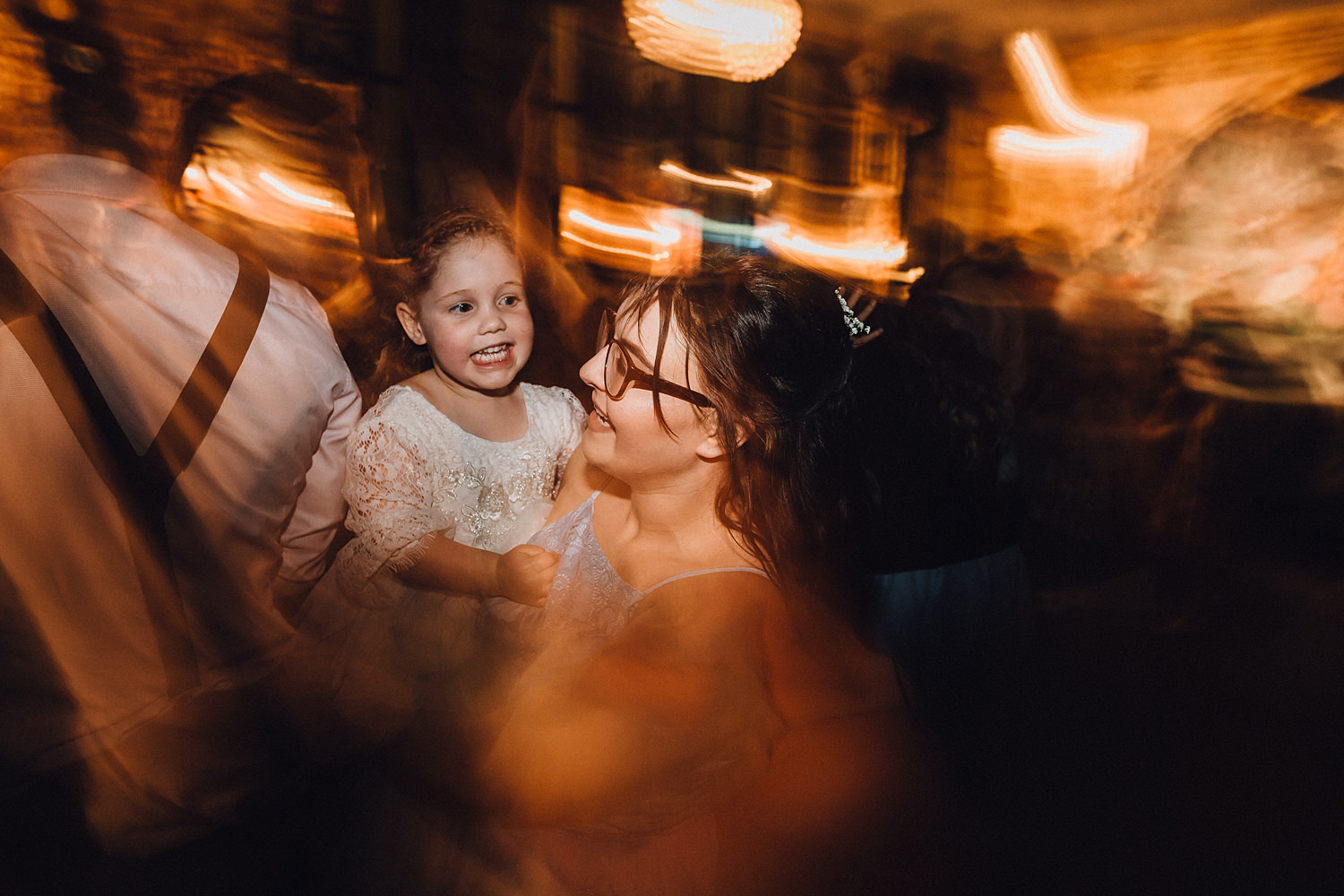 Flower Girl Dancing With Bridesmaid