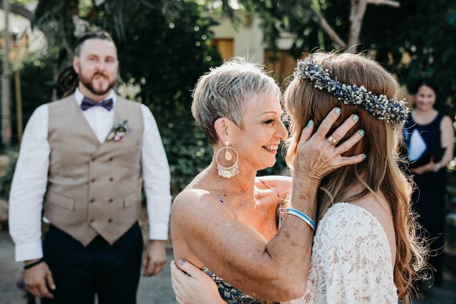 Mother Of Bride Kissing Daughter